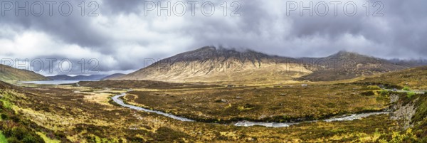 Panorama of Eas a' Bhradain waterfall, Red Cuillin mountains, Loch Ainort, Isle of Skye, Scotland,