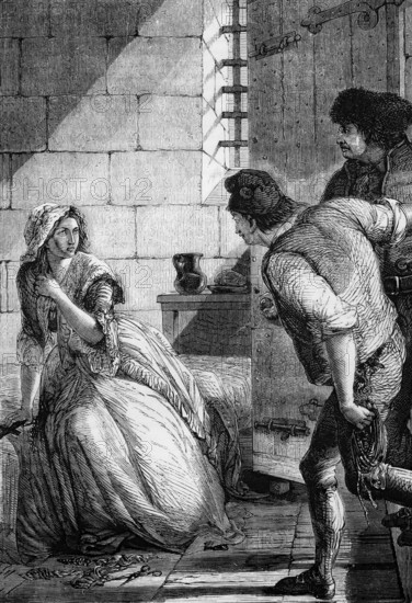 Marie Antoinette leaves prison in front of being driven through Paris in an open cart to her