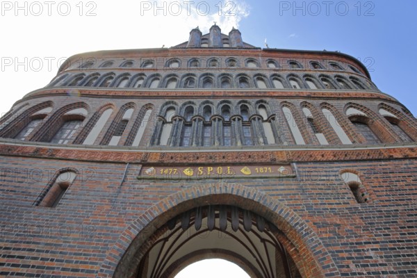 Historic Holstentor with trapdoor, view upwards, perspective, Brick Gothic, brick building, city