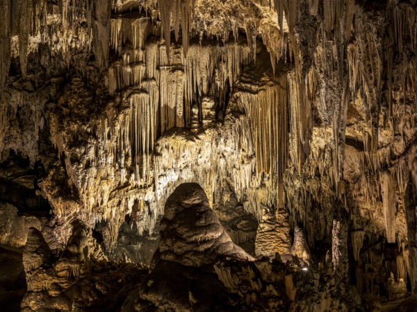 Cueva de Nerja, illuminated cave, large stalagmites and stalagtites, Nerja, Andalusia, Spain