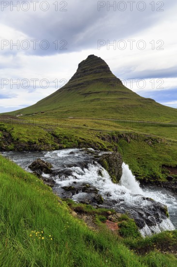 Kirkjufell mountain, film set at Kirkjufellfoss waterfall, Kirkjufellsa river, Grundarfjördur,