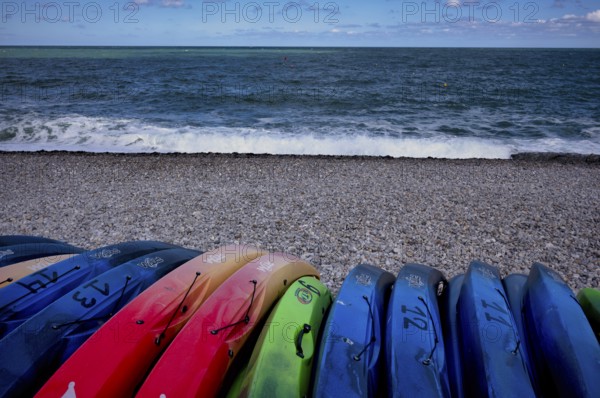 Kayaks, boats, colourful, lying on the beach, pebble beach, Étretat, sea, Normandy, Seine-Maritime,