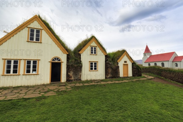 Grass sod houses and church, green roofs, peat farm or peat museum Glaumbaer or Glaumbær, open-air