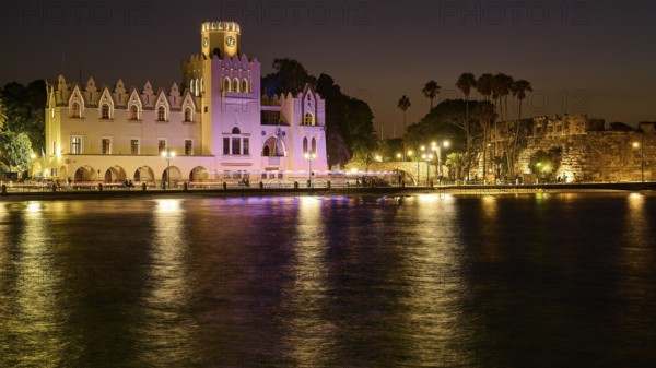 Palace of Justice, colonial building, night shot of a historic building with lights, palm trees and