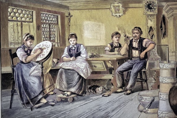 Family on a Sunday afternoon in a living room on a farm in the Appenzell area, a region in