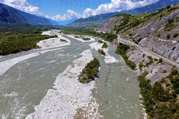 Unregulated river course in a natural riverbed, the Rhone, also known as the Rotten, flows through
