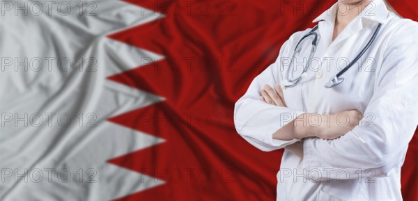 Doctor with crossed arms on Bahrain flag. Bahrain health and care concept. Female doctor on Bahrain