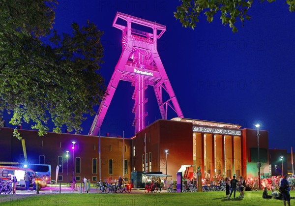 People in front of the German Mining Museum for the Extra Shift at night, Bochum, Ruhr Area, North