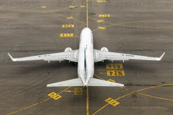 A Boeing 737-800 aircraft of Xiamenair with registration number B-6490 at Chek Lap Kok Airport