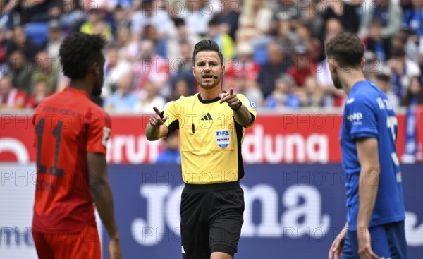 Referee Referee Daniel Schlager cautions Kingsley Coman FC Bayern Munich FCB (11) Arthur Chaves TSG