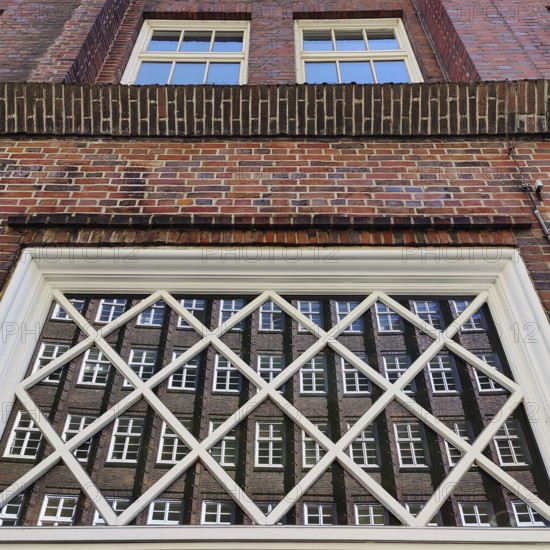 Reflection of the façade of the Sprinkenhof, Brick Expressionism, Kontorhausviertel, UNESCO World