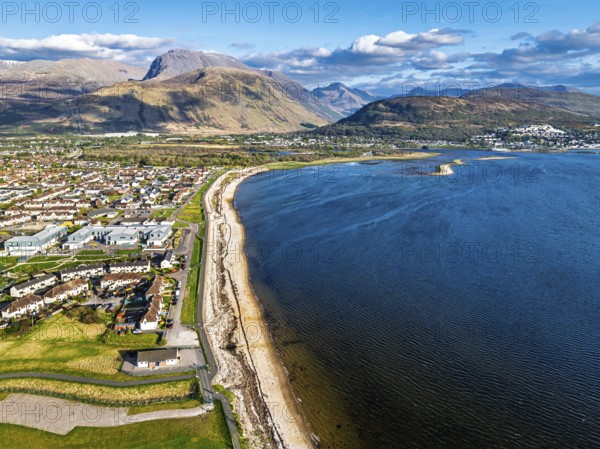 View of Caol Beach and Nevis Range Mountains from a drone, Corpach, Fort William, Highland,