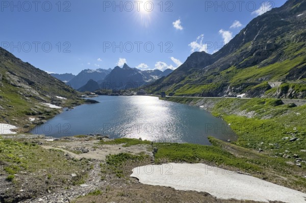 View from Swiss territory to Italian territory over mountain lake Lac du Grand Saint Bernard on top