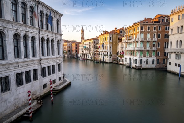 View of the Grand Canal at sunset, long exposure, picturesque evening mood with palazzos on the