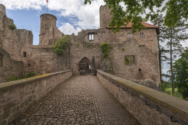 Entrance to the partially restored medieval castle ruins of Hanstein on a red sandstone rock,