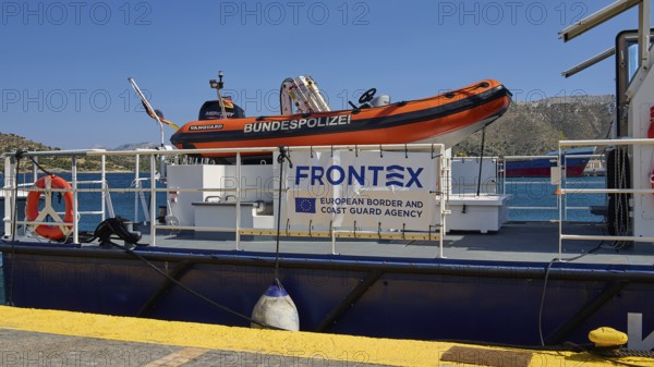 FRONTEX coast guard boat at the dock with orange dinghy on board, Lakki, Leros, Dodecanese, Greek