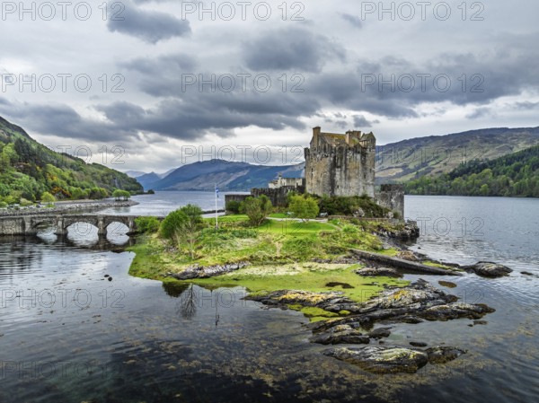 Eilean Donan Castle and Loch Duich from a drone, Isle of Skye, Highlands, Scotland, England, United