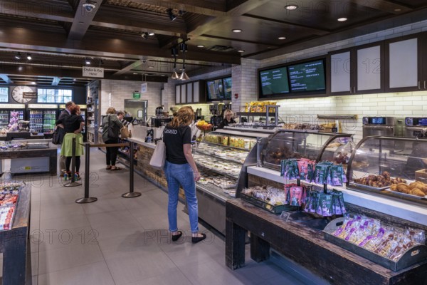 Guests shopping for coffee, food, and snacks at the Starbucks in Gaylord Opryland Resort and