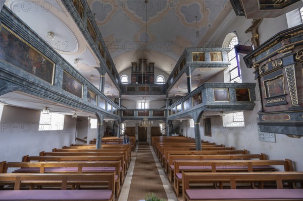 Interior with organ gallery and surrounding double galleries, historic Evangelical Lutheran
