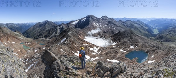Mountain panorama, mountaineer in rocky high mountain landscape at the Rotgratscharte, view of