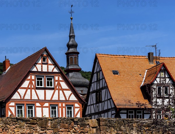 The old town centre with half-timbered houses, church towers and remains of the town wall in