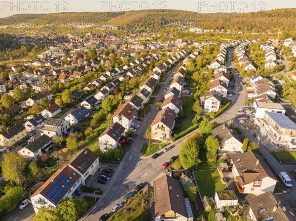 Residential area with terraced houses in a green landscape and hilly surroundings, Nagold, Black