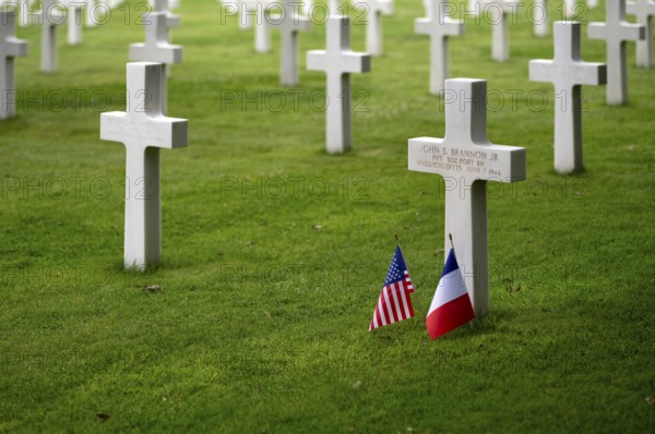 US flag and French flag at the grave of John S Brannon jr, gravestones, war graves, military