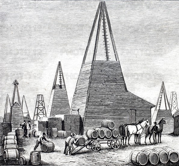 Petroleum wells in Oelheim, Ölheim, oil production, drilling tower with basins in front of it to