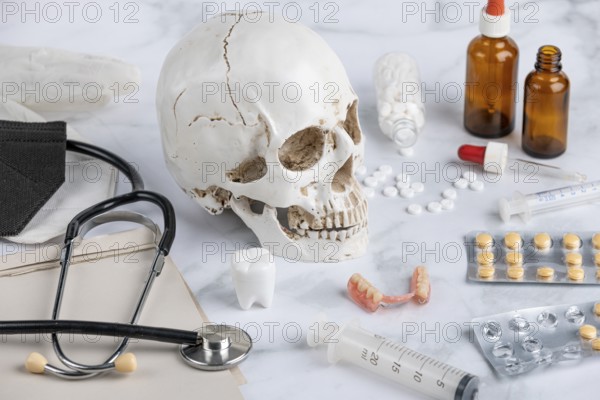 Medical utensils, tablets with skull and teeth