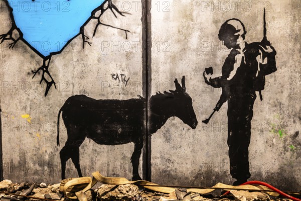 Banksy - The Separation Barrier and Bethlehem Murals, barrier between Israel and the occupied West