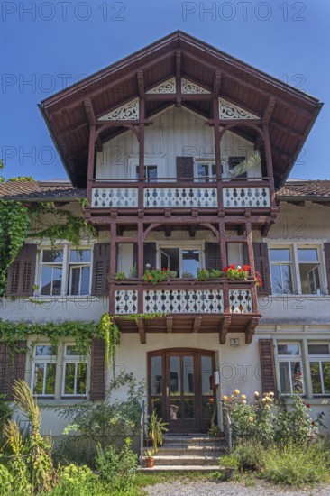Old villa with wooden shingle façade, large balcony with floral decorations, around 1900, Dornbirn,