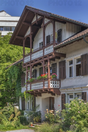 Old villa with wooden shingle façade, large balcony with floral decorations, around 1900, Dornbirn,