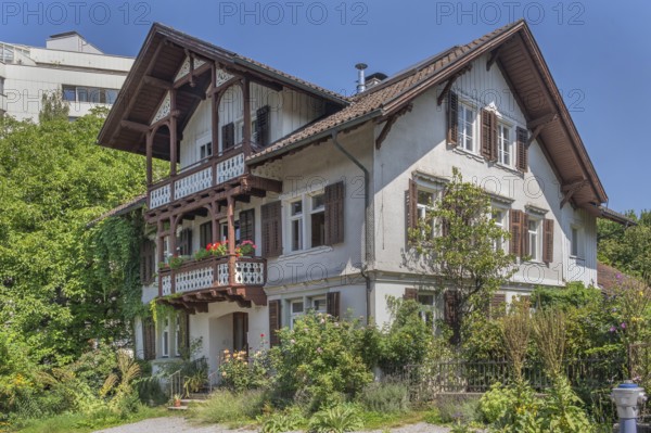 Old villa with wooden shingle façade, large balcony with floral decorations, around 1900, Dornbirn,