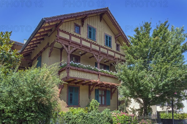 Ochre yellow wooden barrel, Villa Auf der Flur with large balcony around 1900, Dornbirn,