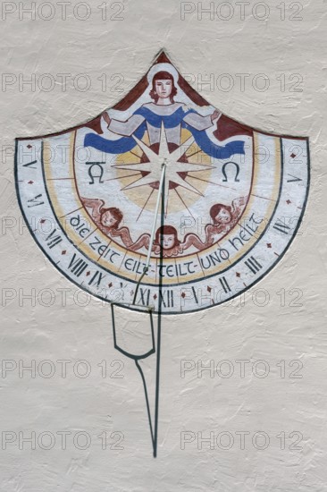 Sundial with the saying, time hurries-divides-and heals, Church of the Assumption of the Virgin