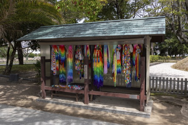 Colourful origami cranes made of paper as a sign of peace in the Peace Park, landmark, UNESCO World