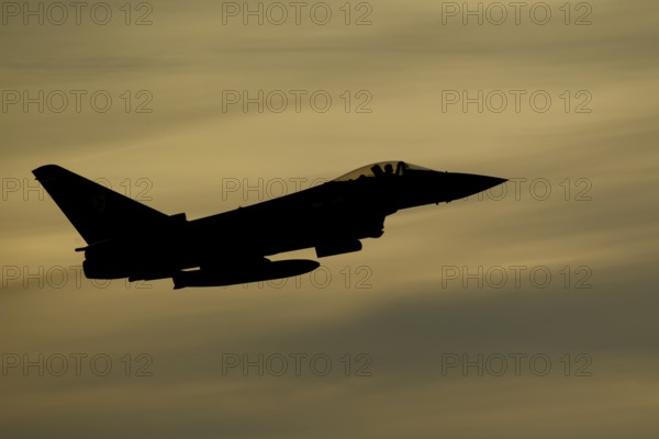 Eurofighter Typhoon silhouette of a military fighter jet aircraft of the Royal air force RAF flying