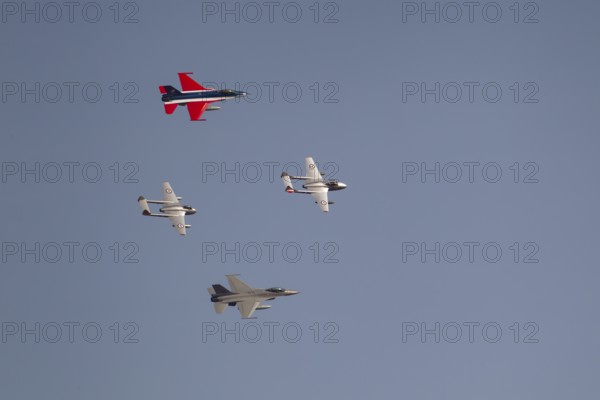 General Dynamics F-16 Fighting Falcon and de Havilland Vampire military jet aircraft of the Royal