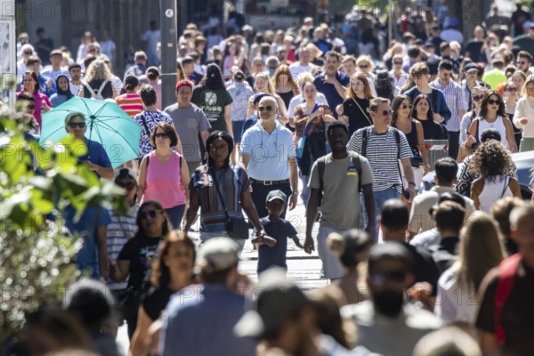 In the sunshine, many people stroll through Stuttgart's Königstraße pedestrian zone. Stuttgart,