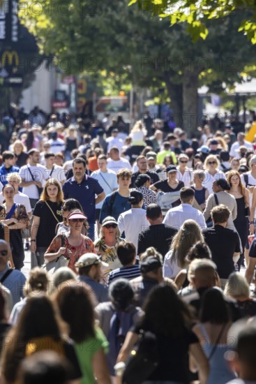 In the sunshine, many people stroll through Stuttgart's Königstraße pedestrian zone. Stuttgart,