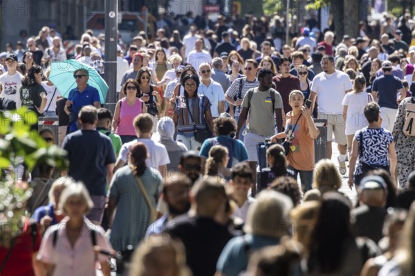 In the sunshine, many people stroll through Stuttgart's Königstraße pedestrian zone. Stuttgart,