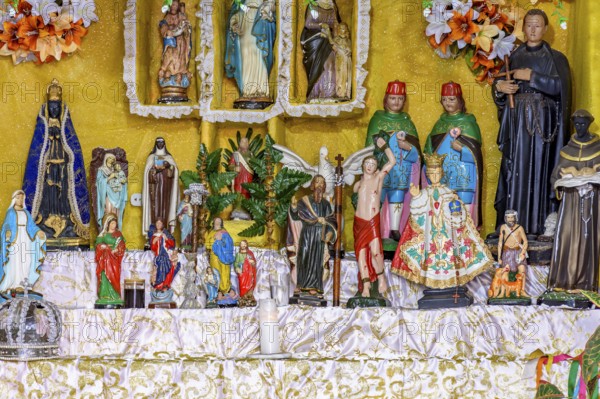 Images of saints and entities present on an Afro-Brazilian altar in Congado in Minas Gerais, Belo
