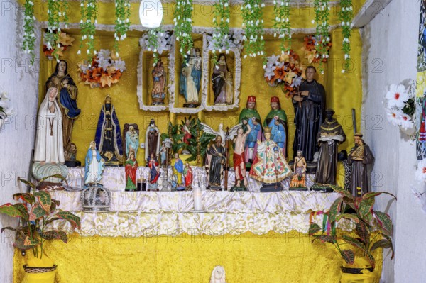 Saints and entities present at an Afro-Brazilian altar in Congado in Minas Gerais, Belo Horizonte,