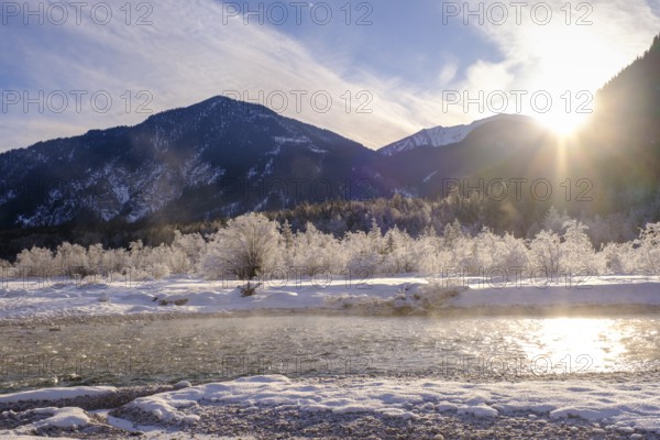 Sunrise in the forest on the young Isar in winter between Wallgau and Vorderriss, Tölzer Land,