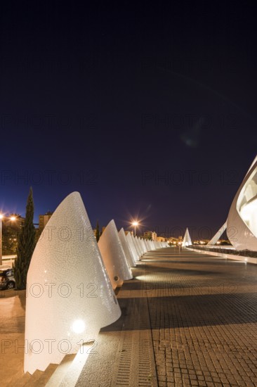 Valencia Spain Modern architectural structure at night with illuminated walkway City of Arts and