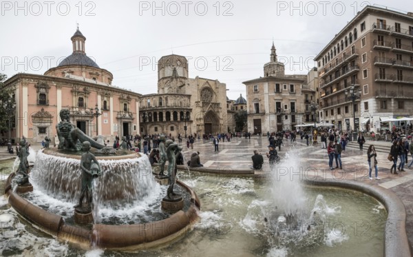 Historic fountain in front of the Virgen de los Desamparados Naval Museum Fuente del Turia fountain