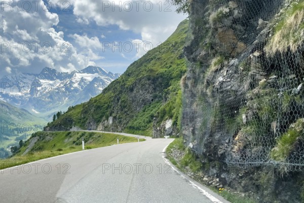View of alpine road pass road south ramp from to Timmelsjoch Passo del Rombo with right at roadside
