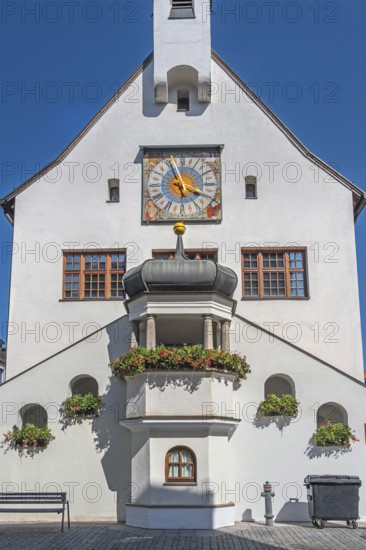 West faÃ§ade with clock and floral decoration, town hall, Kempten, AllgÃ¤u, Bavaria, Germany
