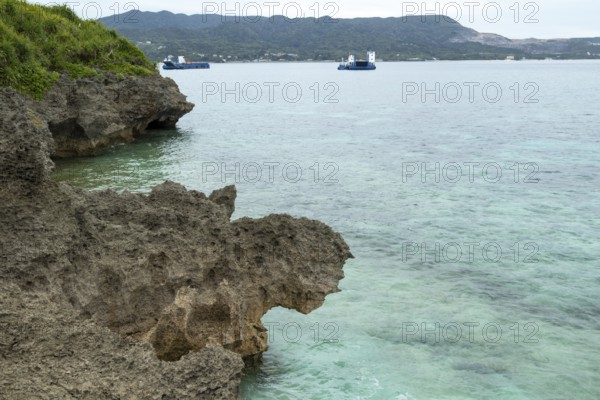 Sesoko's tail, rock formation, rugged cliffs of volcanic rock at the southern tip of Sesoko-jima,