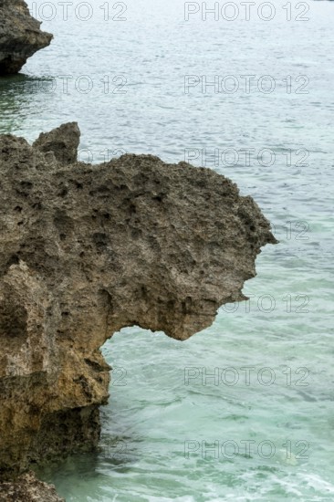 Sesoko's tail, rock formation, rugged cliffs of volcanic rock at the southern tip of Sesoko-jima,